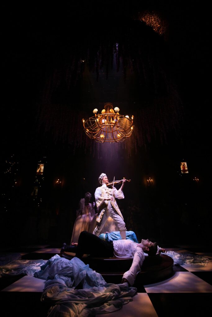 Alfiya Glow playing violin onstage at A Bridgerton Experience in LA